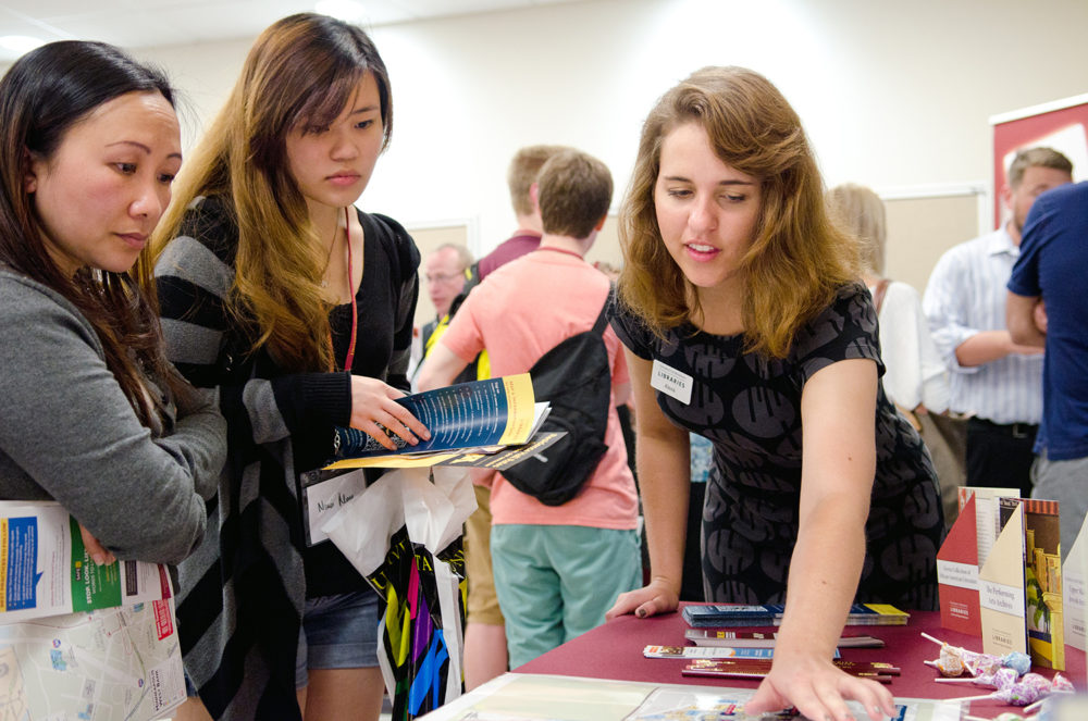 Alexa Wright, a senior English major and peer research consultant, with students and parents at Freshment Orientation 2014
