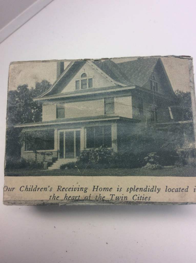 The Lutheran Social Service of Minnesota records include etched stamps used for producing publications. This photo shows a stamp with the image of the Children's Receiving Home ca. 1925-1940.