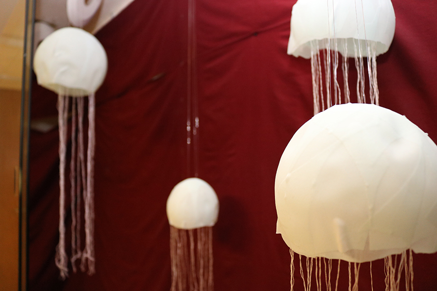 Handmade jellyfish are displayed as the Underwater exhibit comes together.