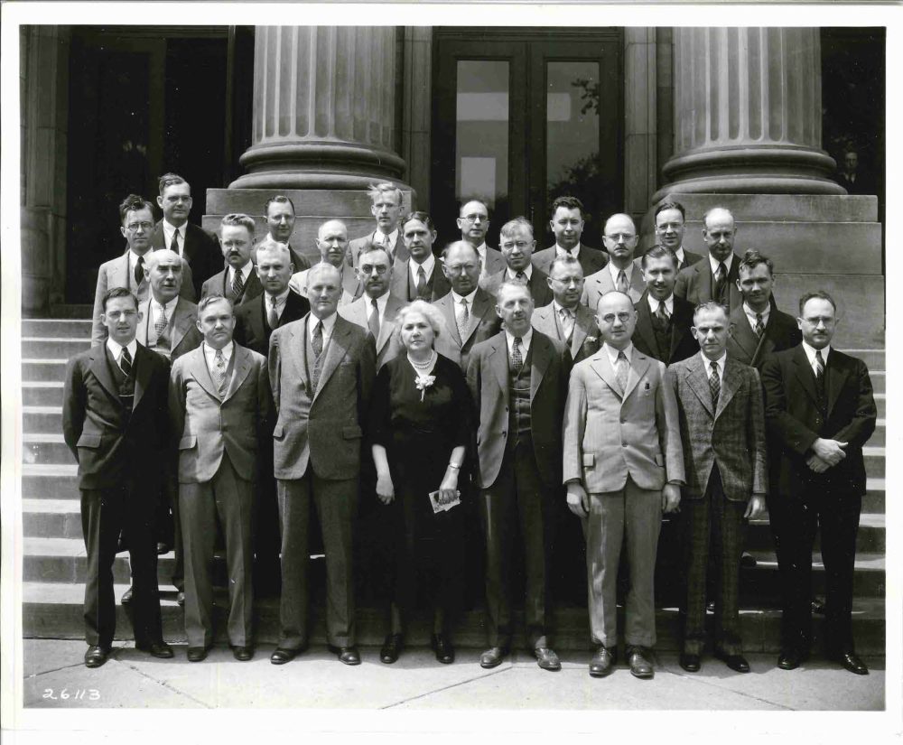 Photograph of the University of Minnesota Department of Chemistry faculty in 1936. Lillian Cohen is pictured front row center.