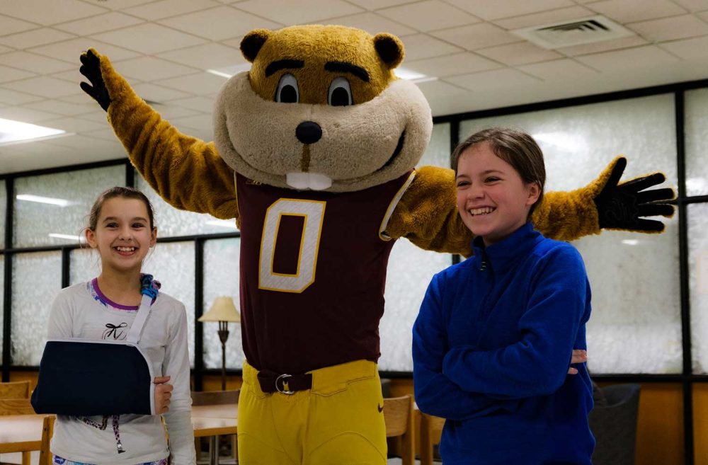 Two Gopherbaloo students posing with Goldy
