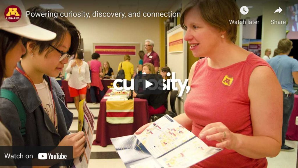 Kate Peterson, right, speaks to two incoming students about the Libraries