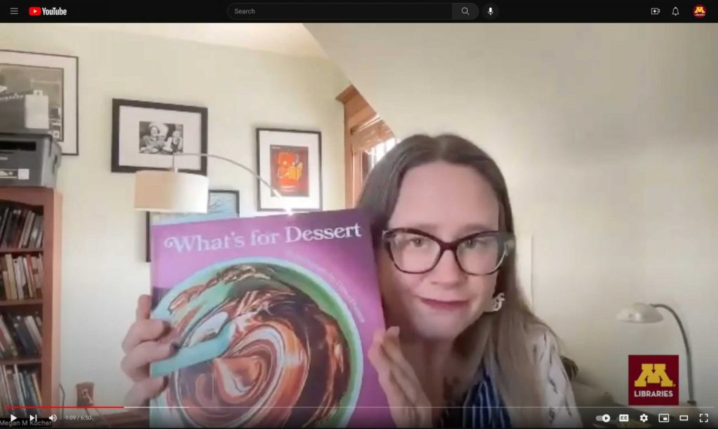 Megan Kocher holding the book "What's for Dessert"