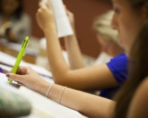 Students taking notes