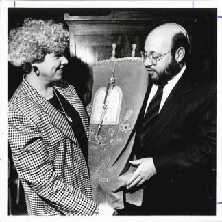 Stacy Offner with Morris Allen, receiving a Torah scroll, undated