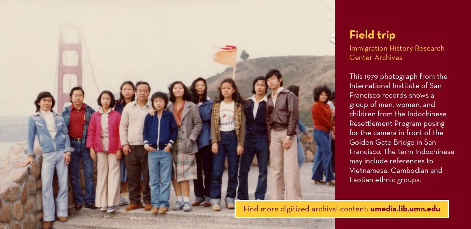 1979 photograph from the International Institute of San Francisco records, showing a group of men, women, and children from the Indochinese Resettlement Program posing for the camera in front of the Golden Gate Bridge in San Francisco. The term Indochinese may include references to Vietnamese, Cambodian and Laotian ethnic groups.