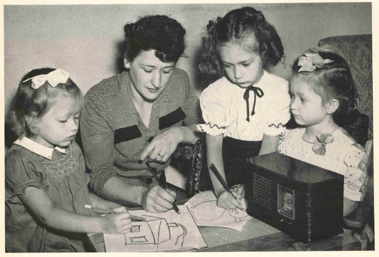 Woman and children create illustrations as they listen to "Drawing to Music" over KUOM, 1946.