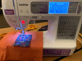 Digital embroidery machine in action.