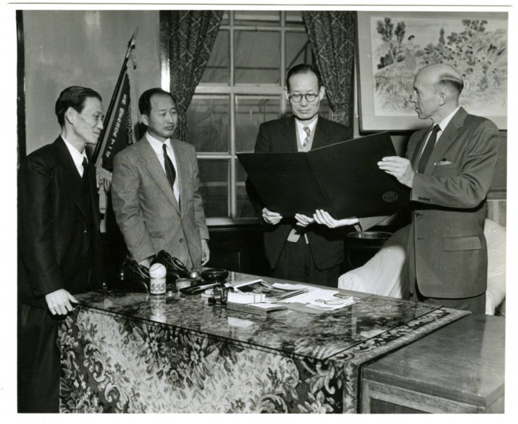 This photograph features Joong Whi Kwon, Dean of Students, Chong Soo Lee, Academic Dean and Vice President Il Sun Yun receiving greetings from. Dr. A. E. Schneider, of the University of Minnesota and Chief Adviser in Korea for the SNU cooperative project, in 1955. Source: University of Minnesota Archives, Arthur E. Schneider Papers (uarc 1142)