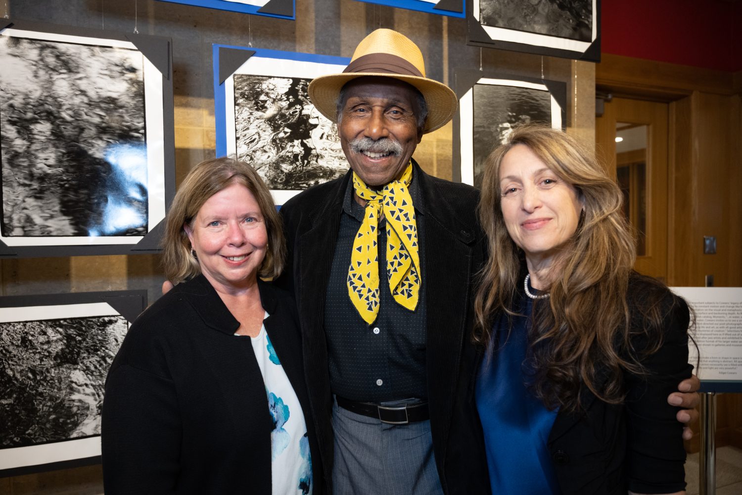 Lisa German, Adger Cowans, and Deborah Ultan at the exhibit opening reception for “The Eyes See What the Heart Feels.” (Photo/Kristine Heykants)