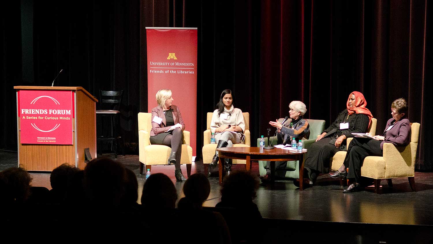 A panel of speakers at the Friends Forum event in 2018 in Coffman Theater.