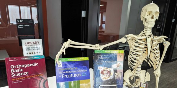 Skeleton and book display on orthopaedics.