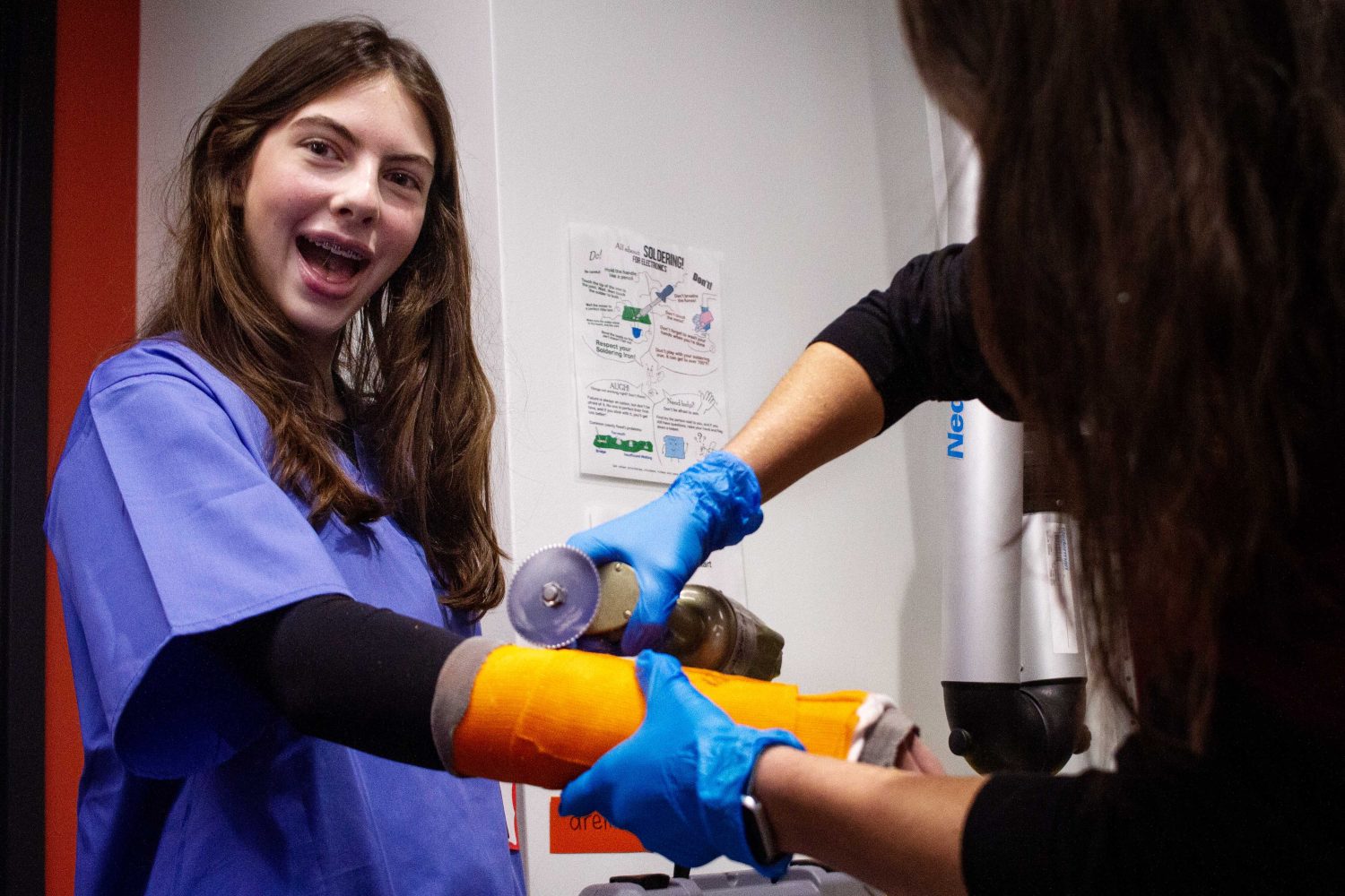 Local high school students learn how to properly wrap a cast, on Saturday, Oct. 28, 2023. (Photo/Adria Carpenter)