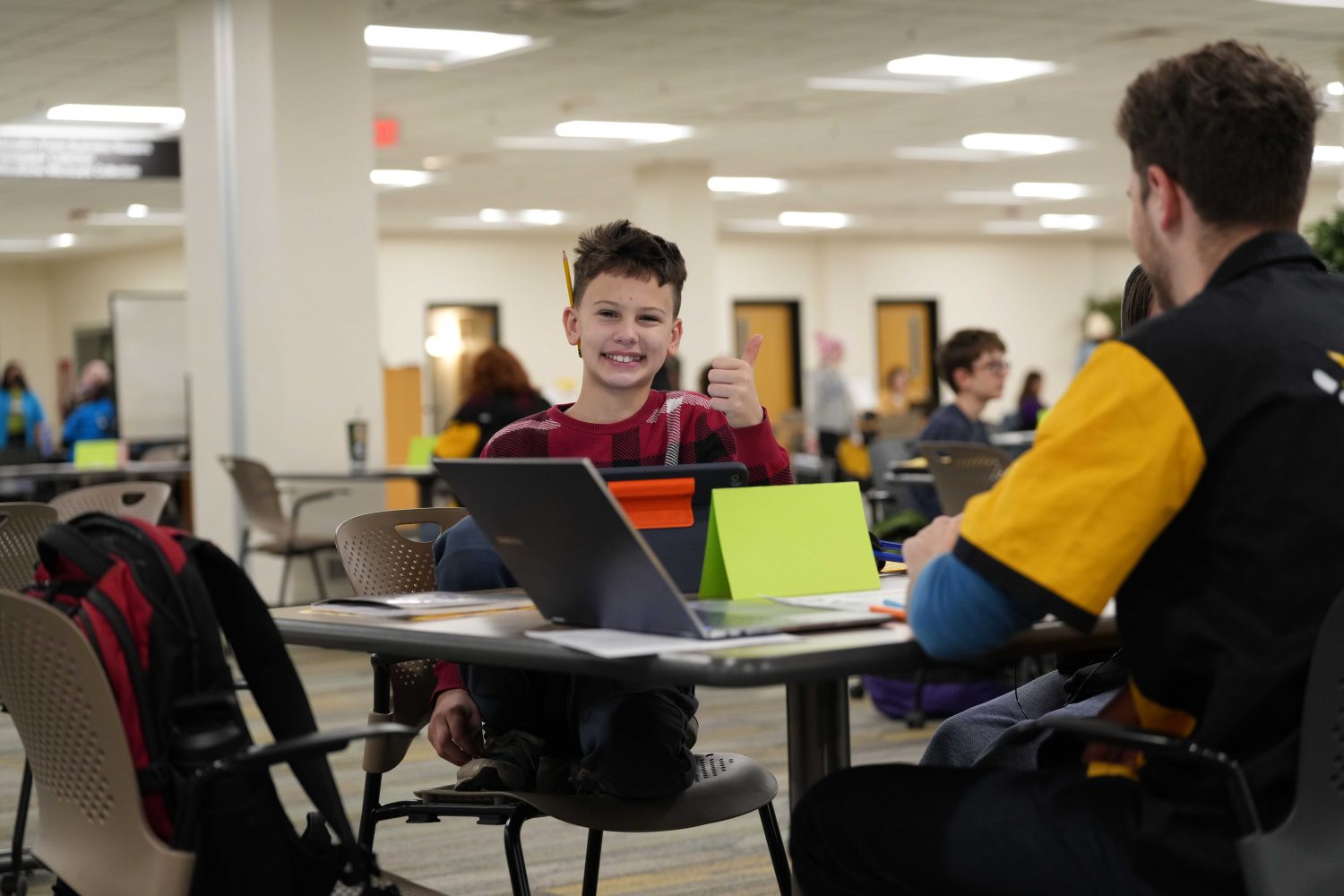 Twin City students work on their National History Day projects at Wilson Library during the annual Gopherbaloo on Saturday, Jan. 13, 2024. (Photo/Luke Logan)