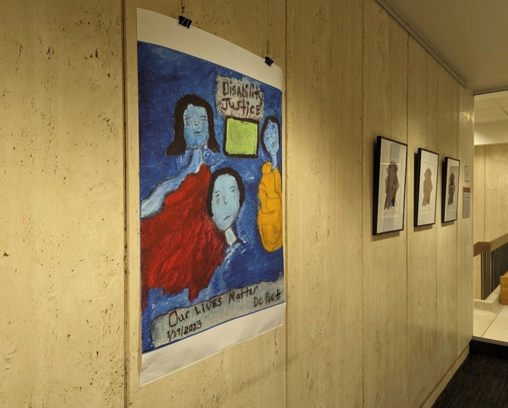 Sample of works from The Art of Disability display in Wilson Library.