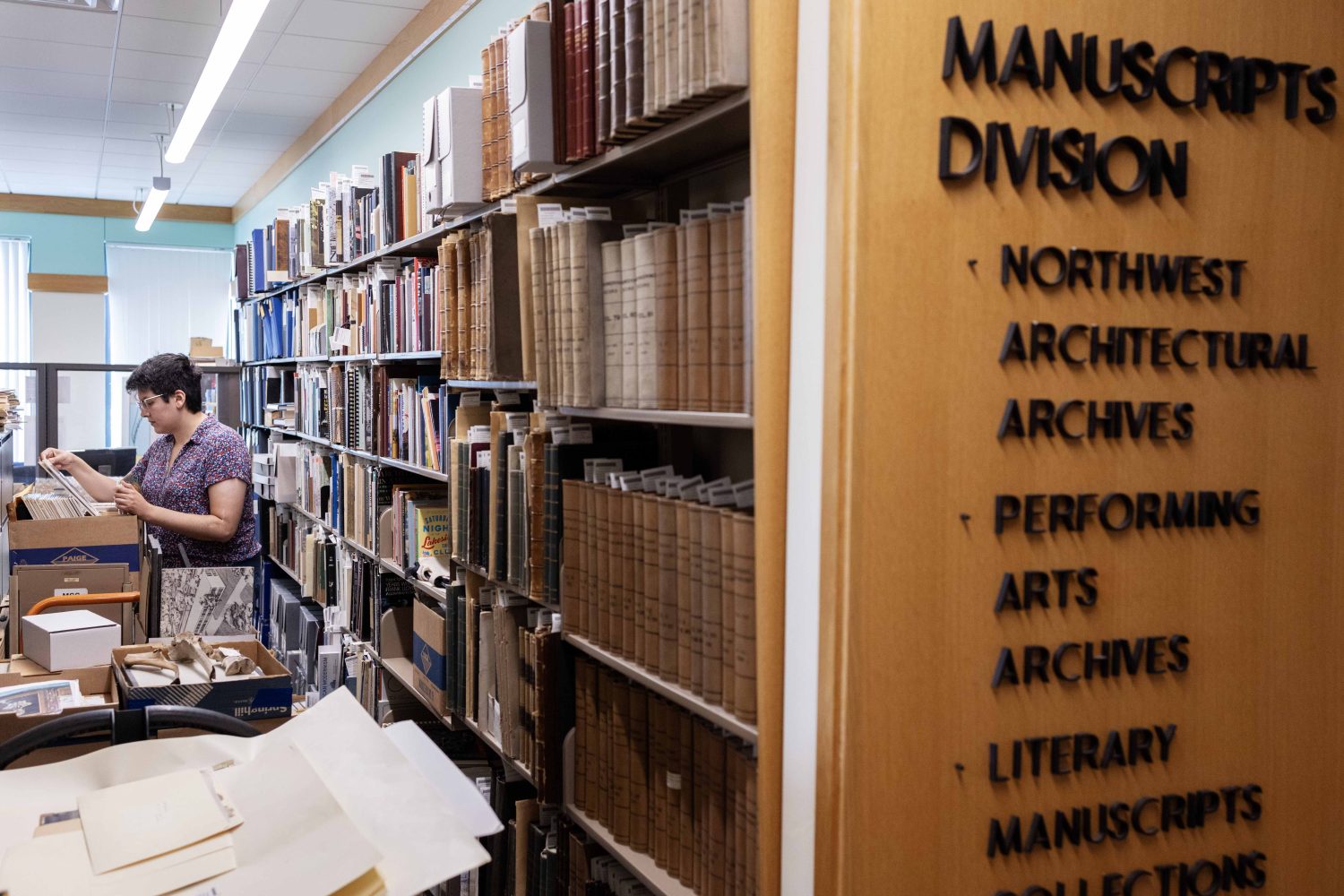 Erin McBrien, curator of the Upper Midwest Literary Archives, poses for a portrait in Andersen Library, on Friday, July 5, 2024. (Photo/Adria Carpenter)