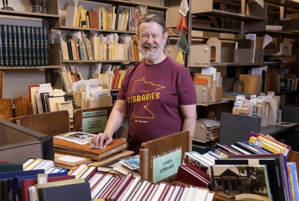 David Faust, the South Asia and Middle East Librarian, poses for a portrait in his office in Wilson Library on Wednesday, September 4, 2024. Faust is retiring from the Libraries this month. (Photo/Adria Carpenter)