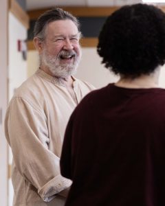 David Faust, the South Asia and Middle East Librarian, talks with friends and coworkers at his retirement party on Tuesday, September 10, 2024. (Photo/Adria Carpenter)