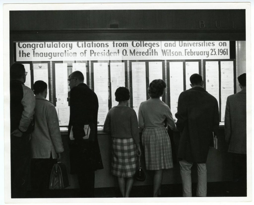 Congratulatory letters posted on display in honor of President O. Meredith Wilson's Inauguration, 1961. University of Minnesota Archives Photograph Collection, https://umedia.lib.umn.edu/item/p16022coll175:21228.