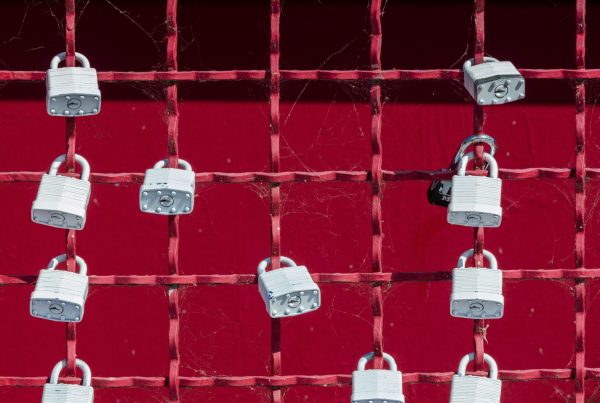 Red wall and grid with locks