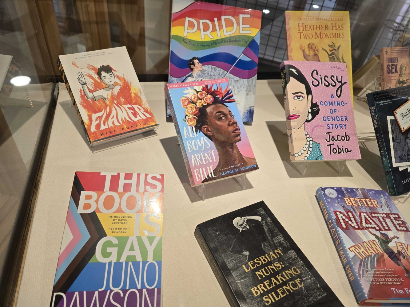 Published books as part of the display in the Tretter Collection’s 25th anniversary exhibit