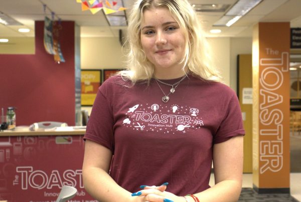 Megan Davis is standing in the Toaster Innovation Hub.